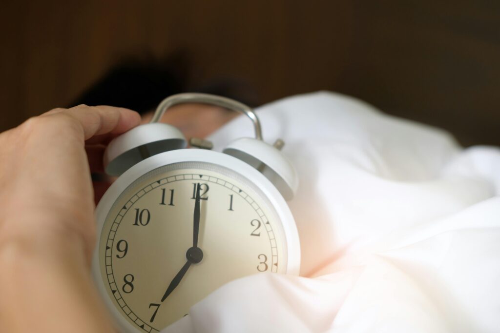 clock representing a sleep routine for adults